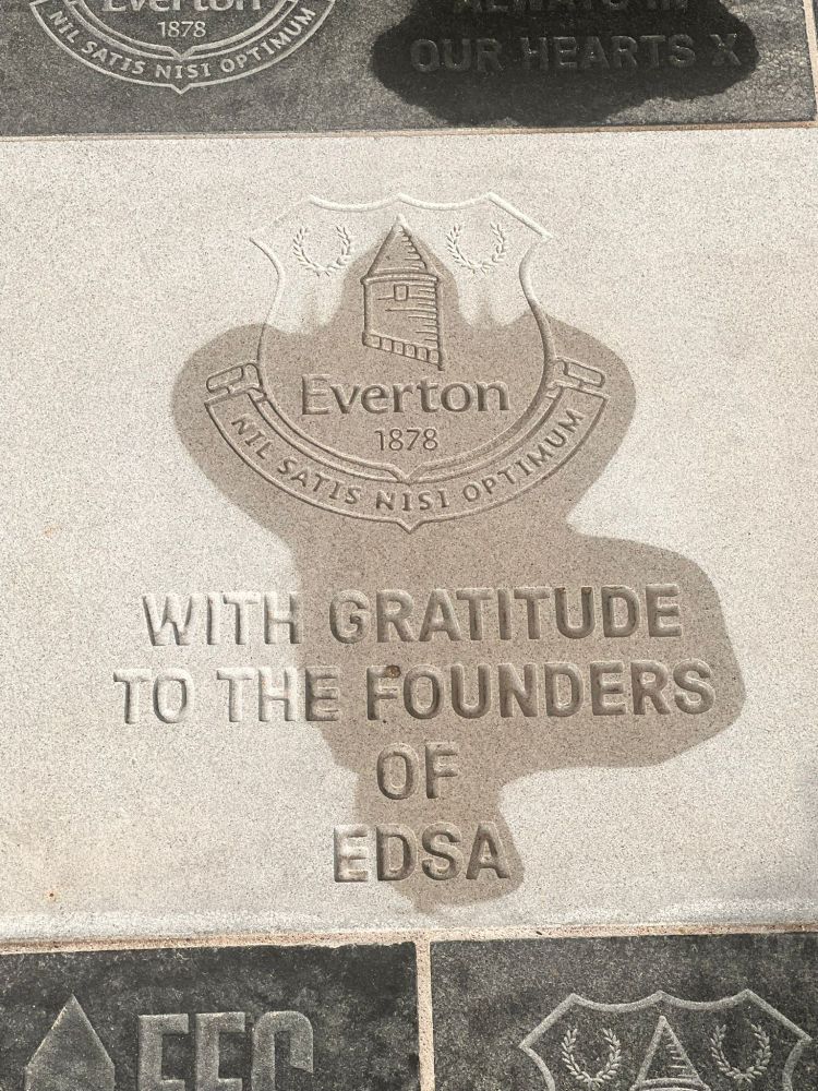Beige granite stone with current Everton crest engraved with following text "With Gratitude to the Founders of EDSA" also engraved underneath the crest