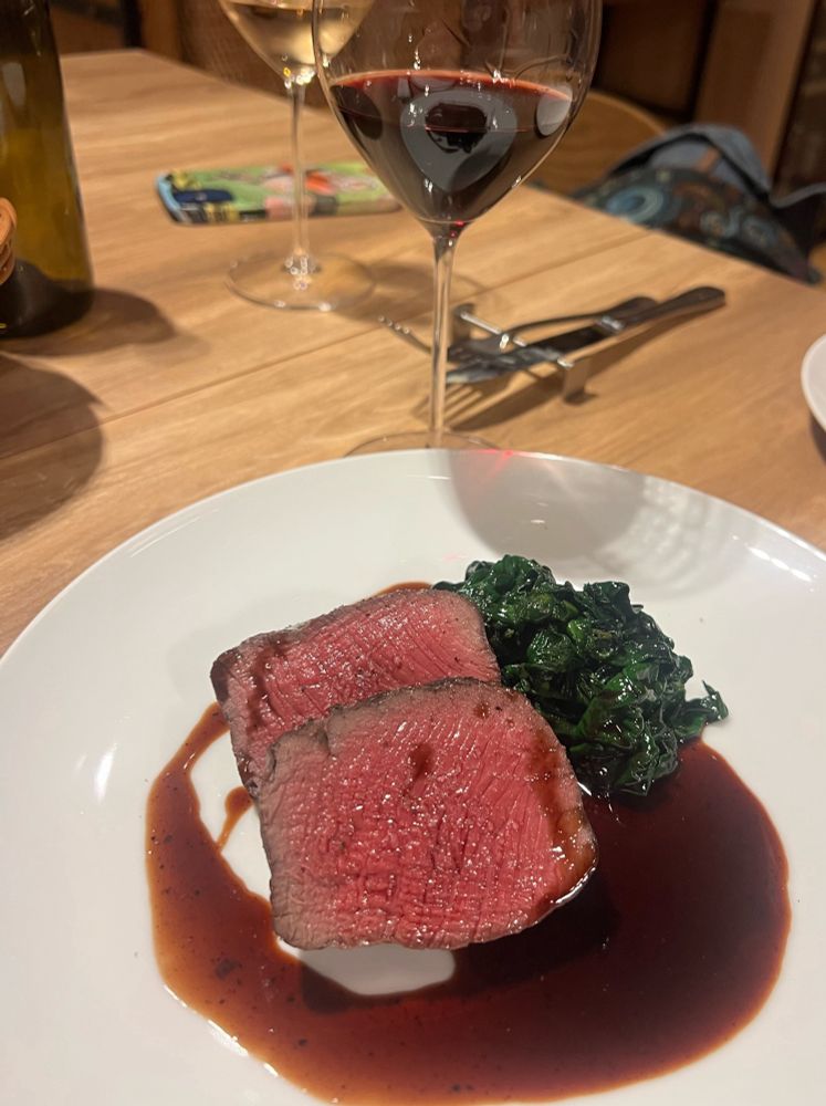 Grilled Kyushu Japanese venison in a reduction sauce with spinach