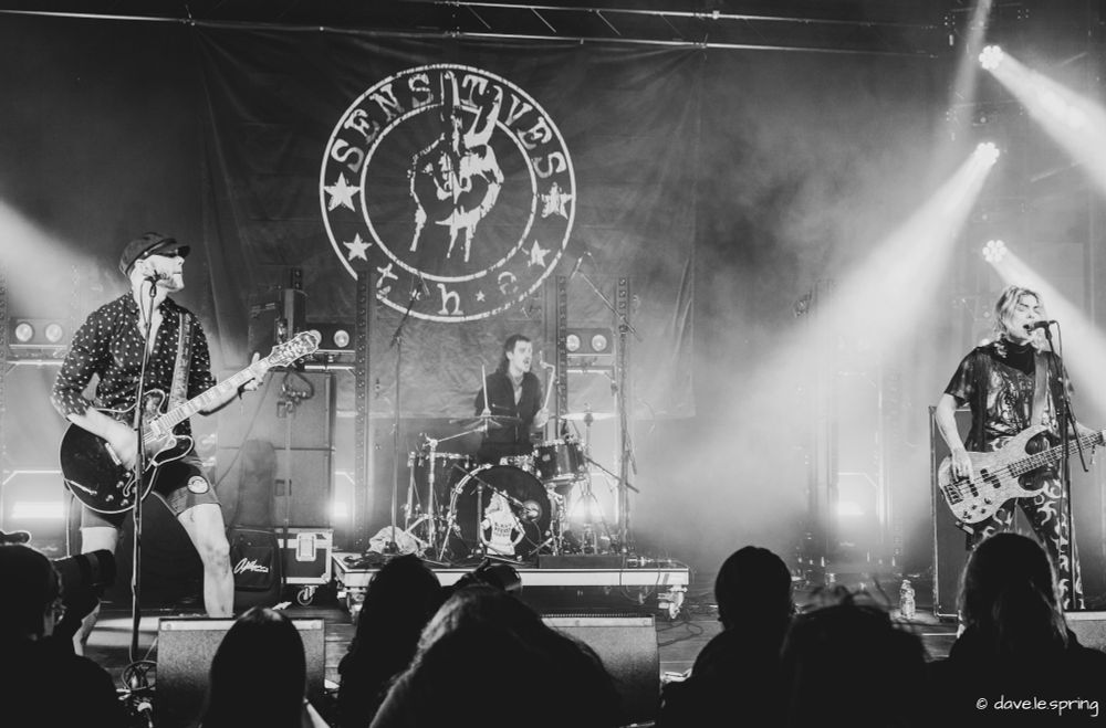Black/white photograph of the Swedish punkband The Sensitives live in concert at the Reitschule in Bern, taken by me at the Blaues Pferd Festival in January 2025