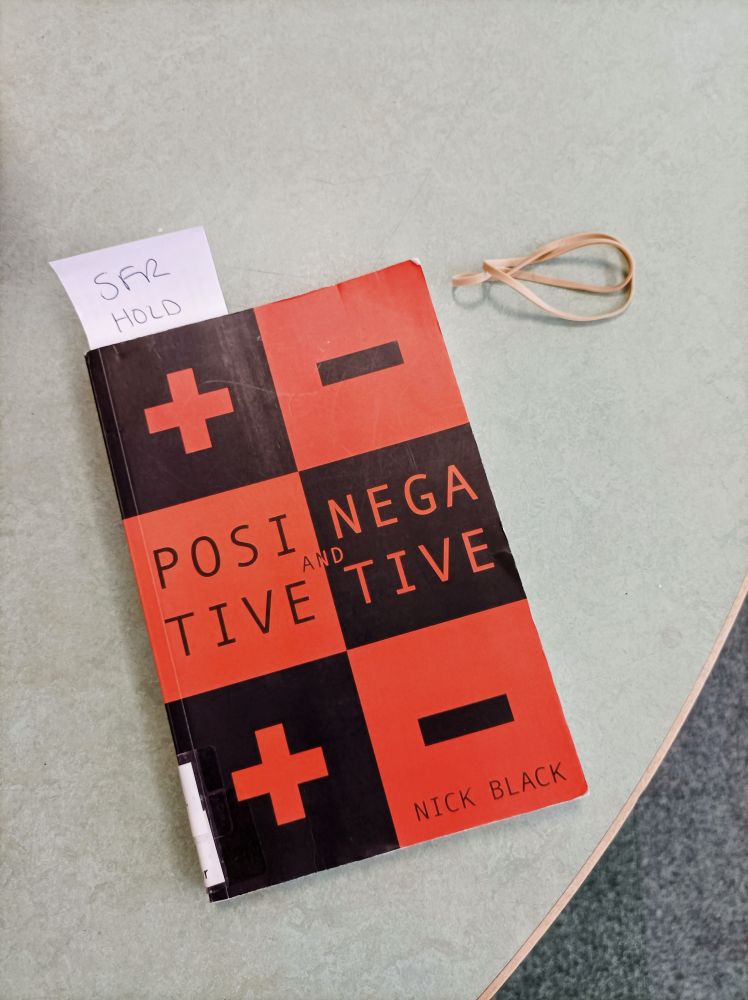 Cover of the short story collection 'Positive and Negative' by @fuzzynick Nick Black. 