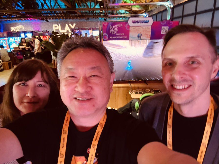 A photograph of Shuhei, Matt Nava, and Tina Kowalewski at the demo for Sword of the Sea at IGN Live.