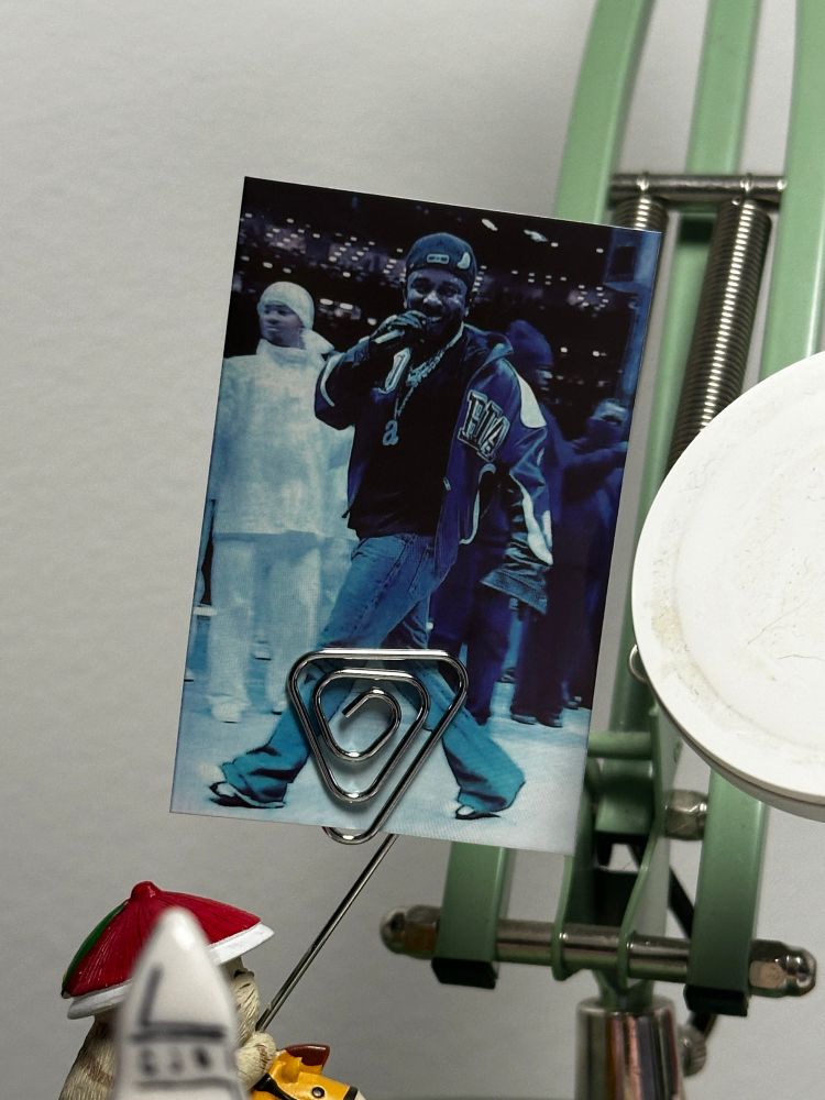 Photo printed of Kendrick performing at the Super Bowl half time displayed cheekily on a desk.