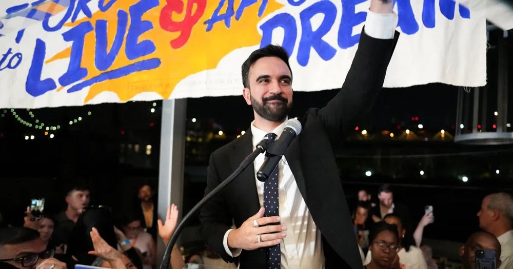 Zohran Mamdani waving