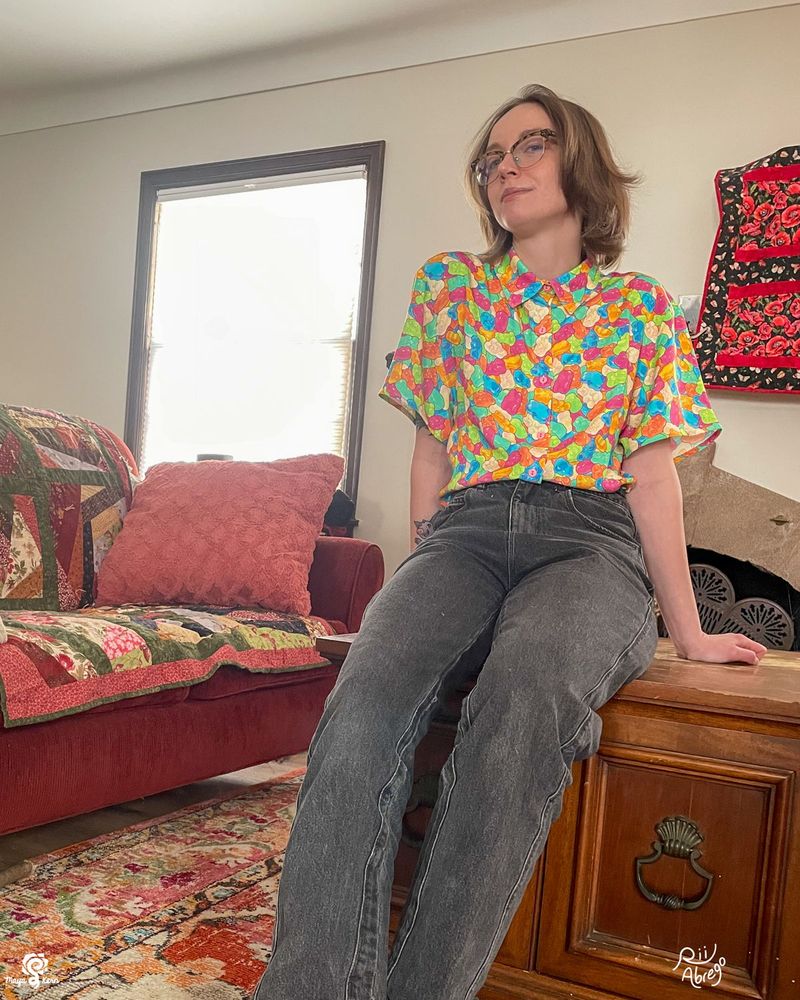 devin wearing the gummy bears button-up in size small