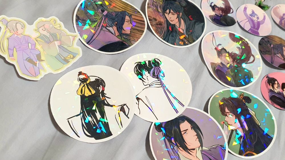 Closeups of sangcheng holo stickers, in a set of 8 designs, there are broken glass effects on the surface of the stickers.