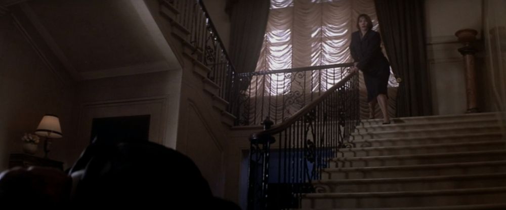 President Zorkin dead at the bottom of the stairs, with his aid frantically calling to him and for help. 