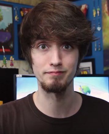 peanut butter gamer. a regular looking guy. he probably wears boots, normal ones.