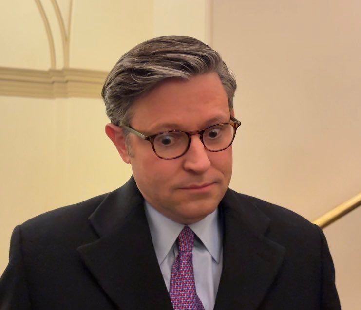 Photo of Mike Johnson looking very nervous/uncomfortable. 