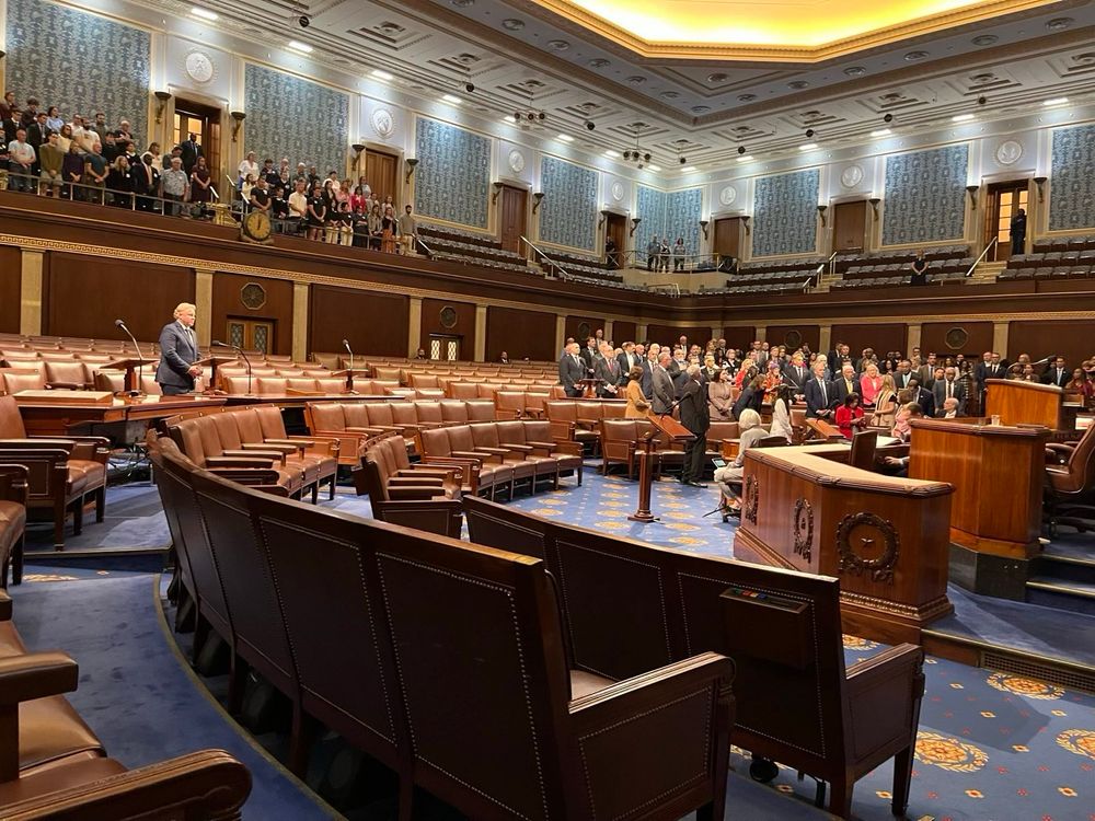 Photo of the House Chamber where Republicans are absent.