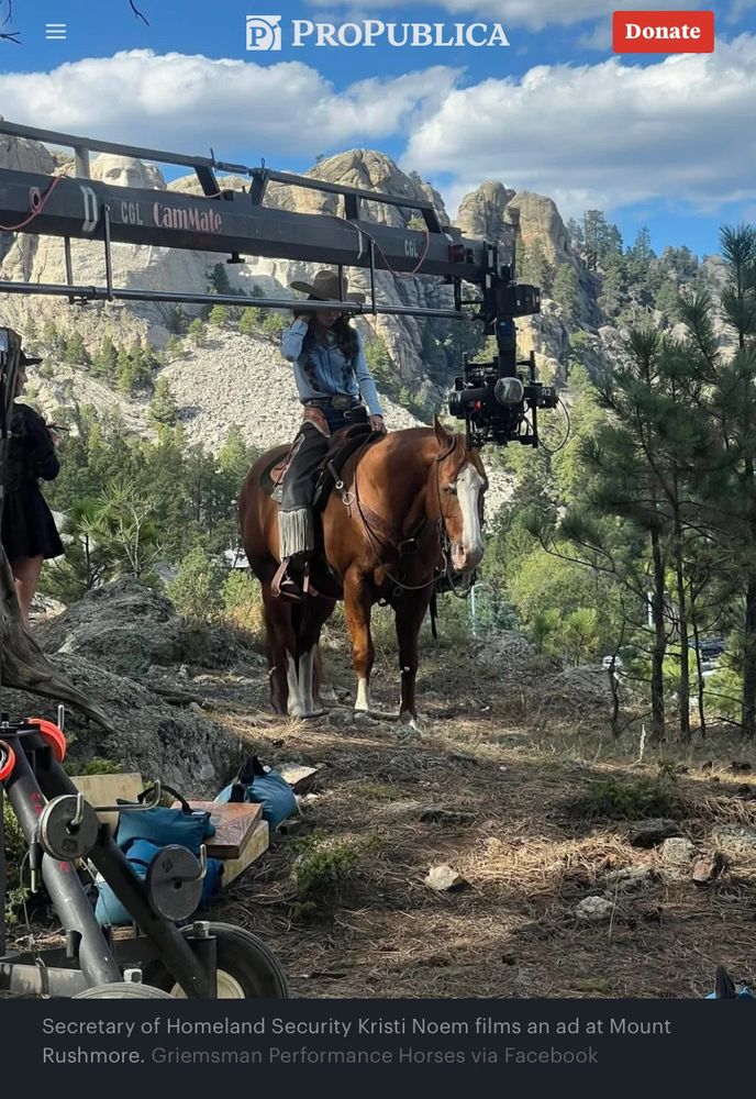 Noem on a horse with a camera 
