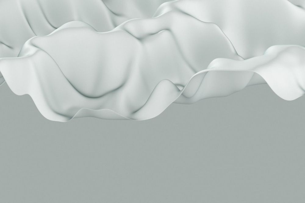 Abstract white flowing fabric with soft shadows