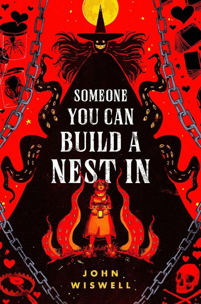 Book cover "Someone you can build a nest in" by John Wiswell, illustrated in eerie red under a yellow moon, with the shape of a dark witch with a cloak and tentacles behind a young, solidly-built young woman carrying a lantern. Chains, skulls, bear traps and other spooky items line the edges.