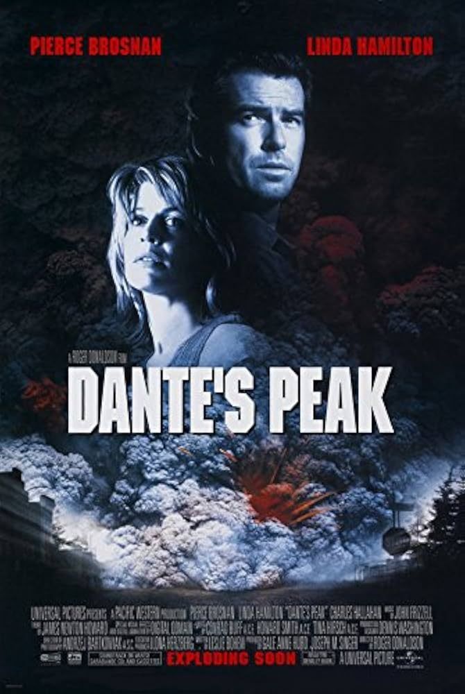 The theatrical poster for the 1997 film Dante's Peak. The poster depicts Pierce Brosnan and Linda Hamilton's faces above an enormous ash cloud racing towards the fictional town of Dante's Peak after a volcanic eruption.