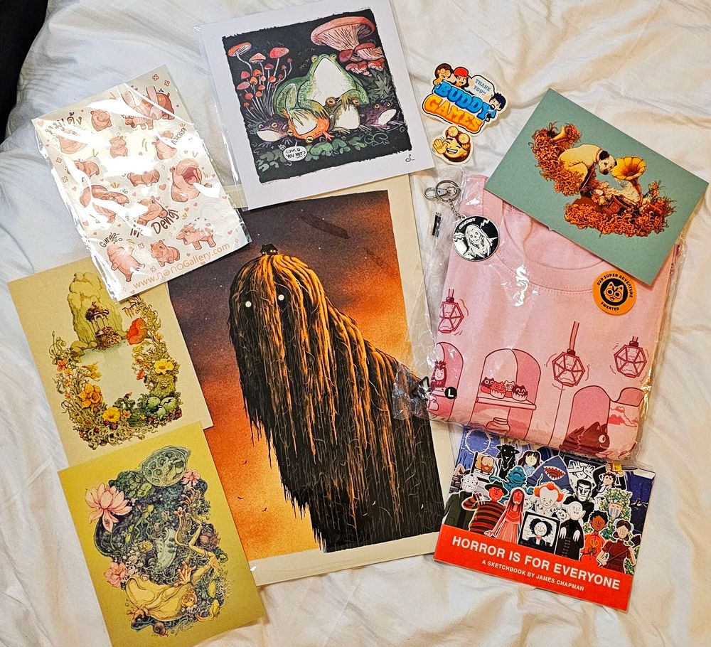 Prints, book, stickers and a sweatshirt