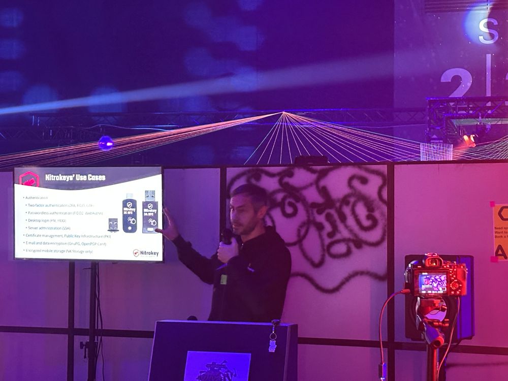 Jan Suhr giving a talk about Nitrokey at 38c3.