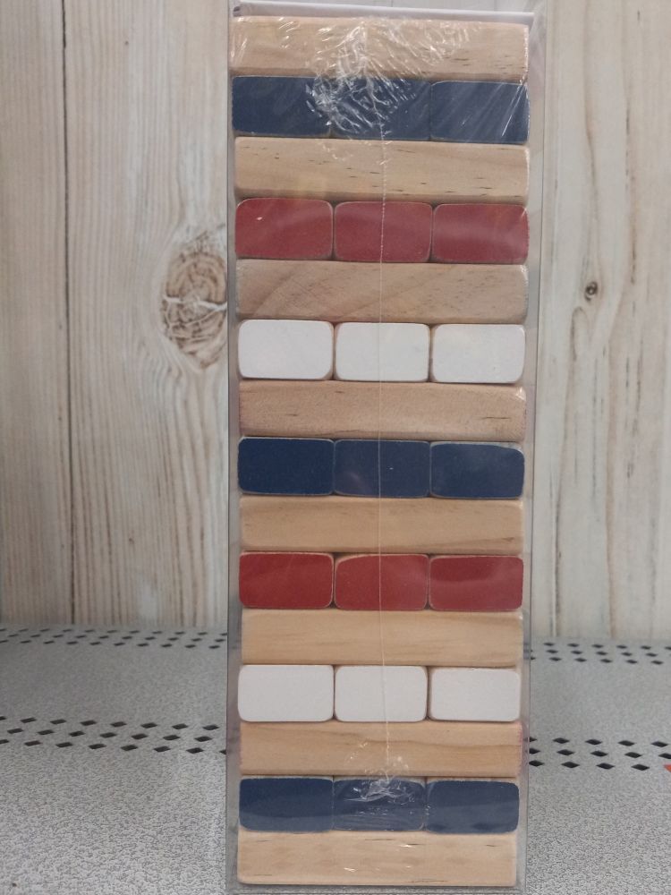 Jenga tower with pieces marked in American patriotic Red/White/Blue