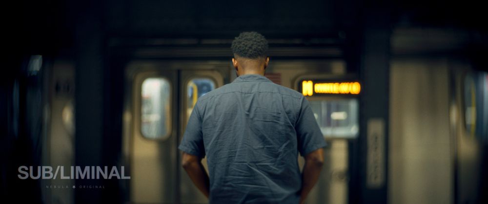 A man waits for a train