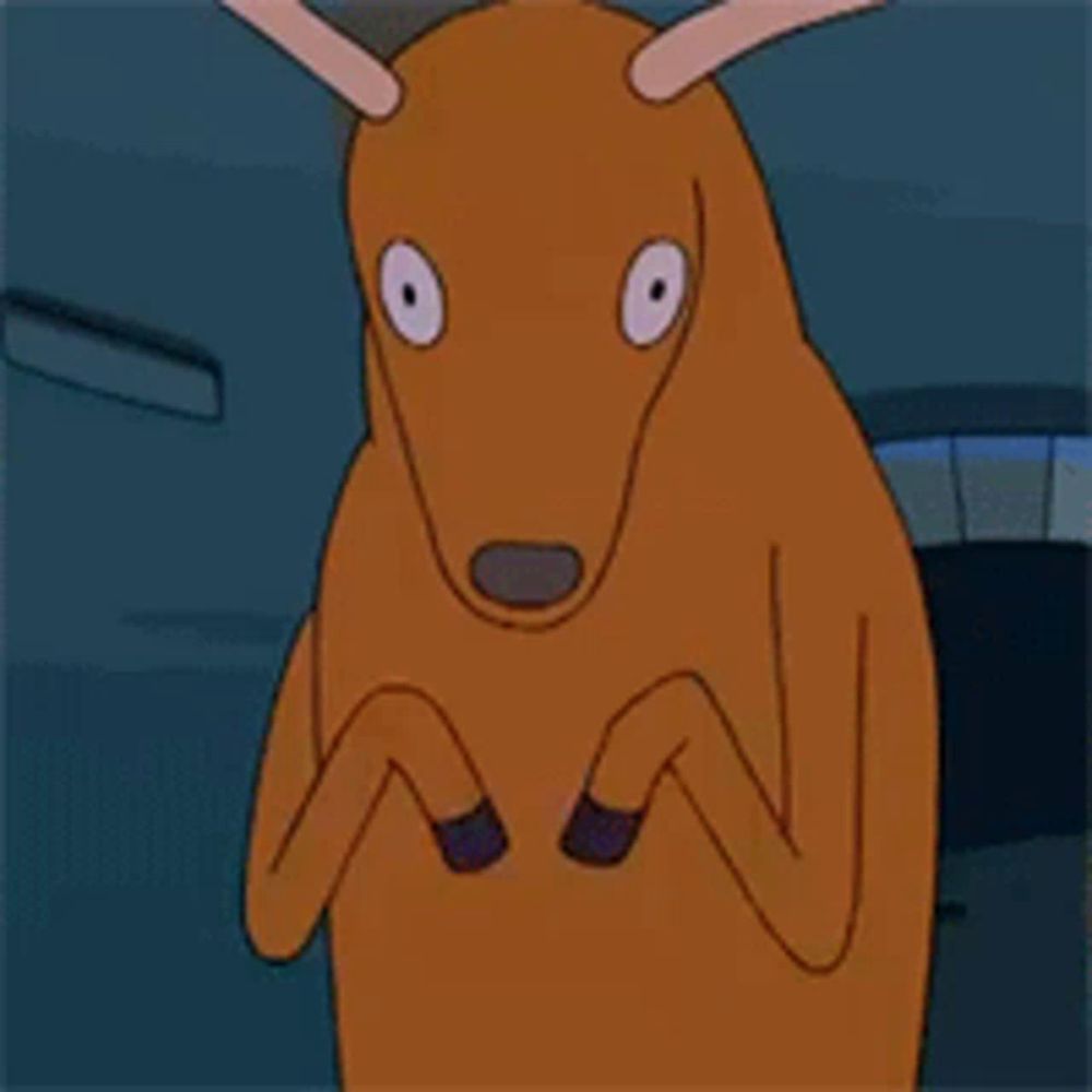 a cartoon deer is holding a cell phone