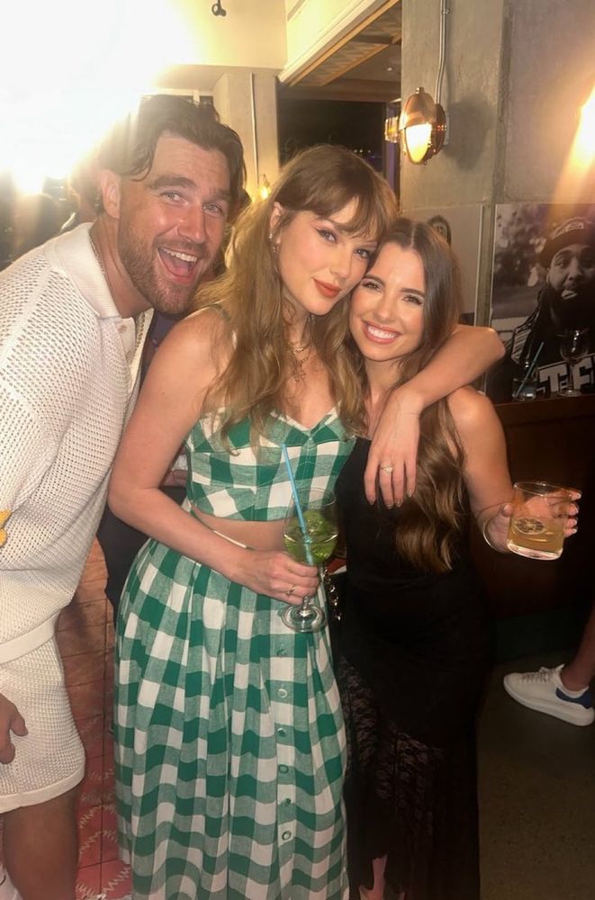 Travis Kelce, Taylor Swift hugging Sophia Scott at TEU.