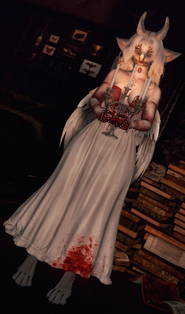 a feathered bat with horns stands holding a candelabra in a dark room with many stacks of books behind her, she's wearing a white gown and gloves with blood staining part of them