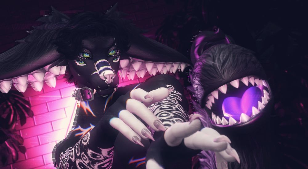 an anthro dog guy with toothy ears and a tail with a mouth on the end it, is posing with his arms pointing off camera.