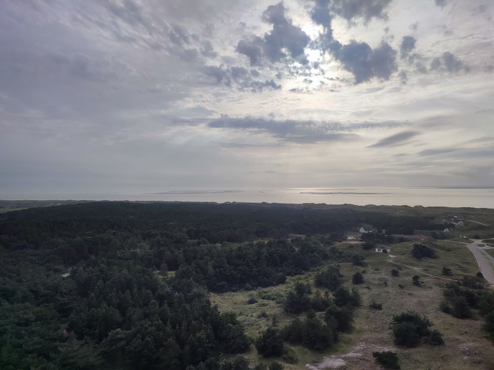 Sky with clouds over beach at Ameland.