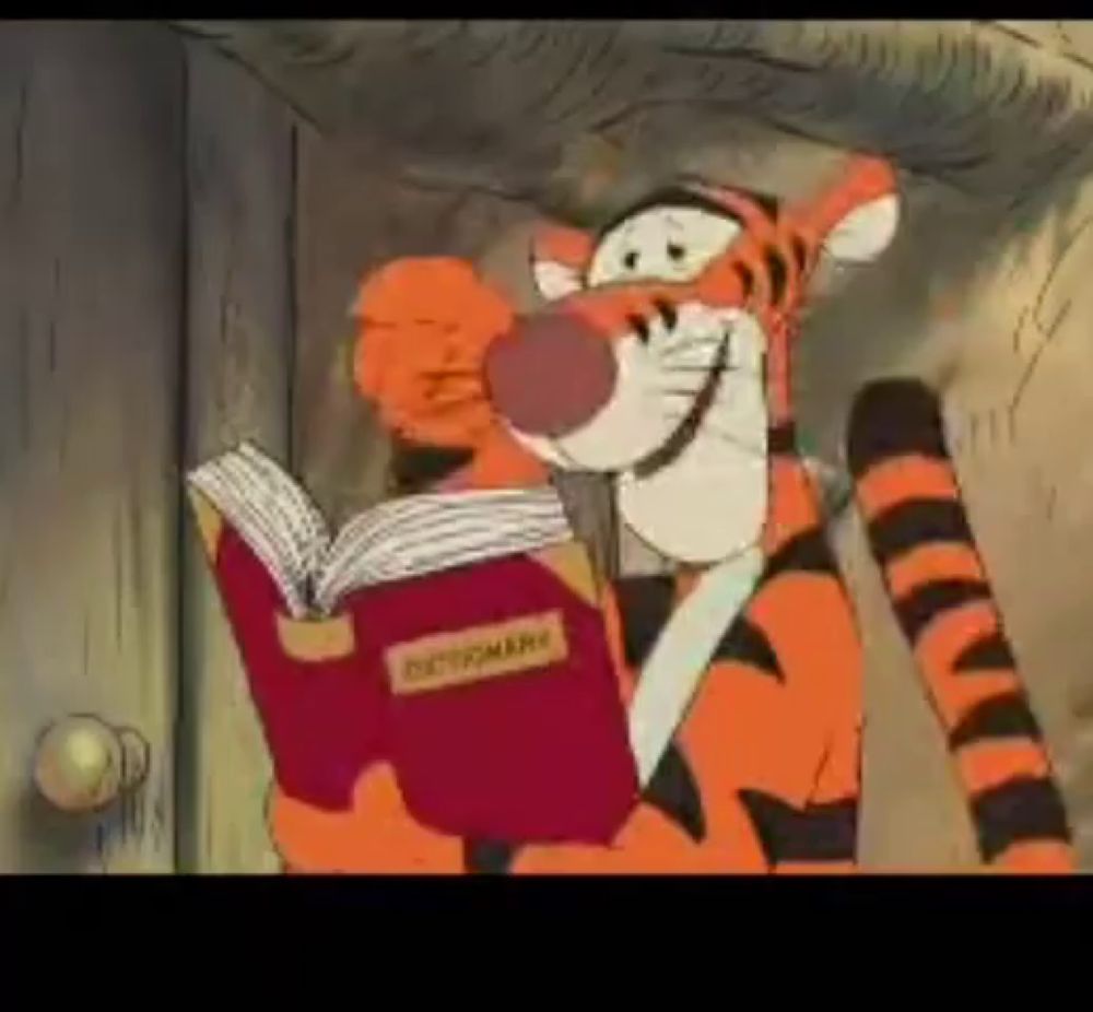 a cartoon tiger is reading a dictionary