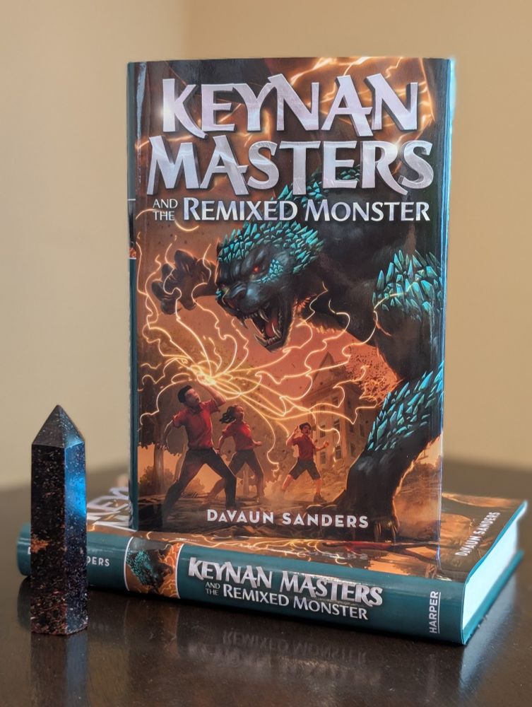 Book cover of Keynan Masters 2, depicting the three friends battling a gargoyle cat-like creature.