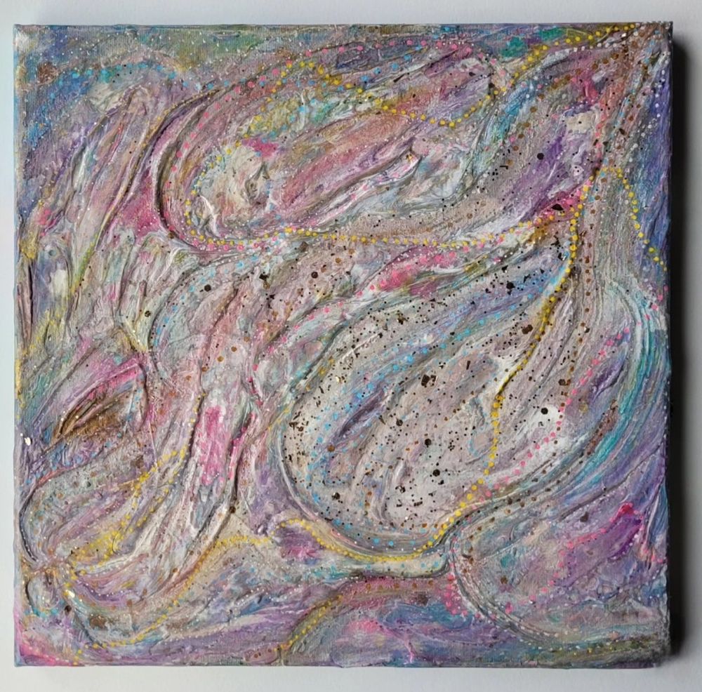 Photo of a textured mixed media intuitive abstract artwork on canvas. Lots of flowing lines and ridges, with dots in colors of yellow, blue, pink, white, silver, bronze, and purple. Chunky bronze glitter towards the center - as if drawn into the waves. The piece itself has an almost washed-out appearance, despite the presence of such punchy color accents.