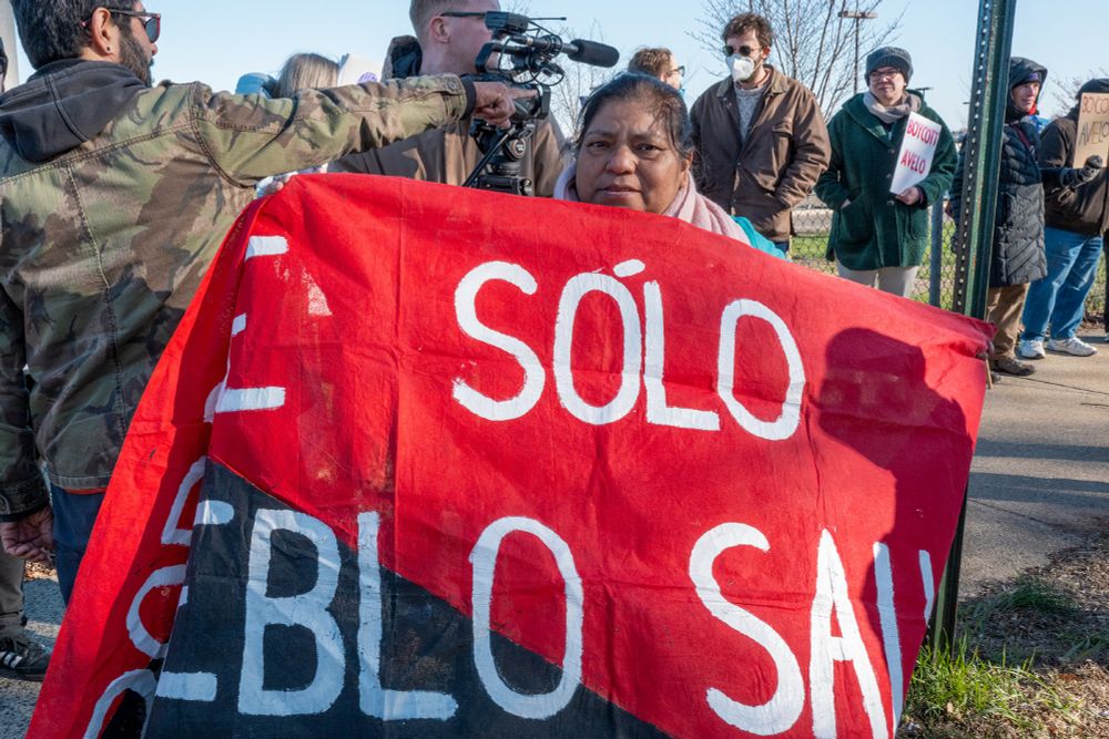 A photo of a protest sign written boldly in Spanish, held by a woman who seems to me to represent the the face of two things, exactly who is being deported and exactly who should be embraced and defended. Defenseless, fearful, and determined. #StandwithHer