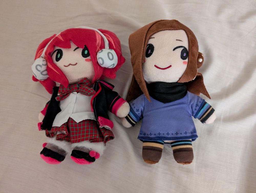 Plushies of Clover and June from 999