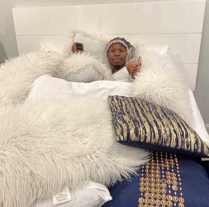 in bed with a glass of wine