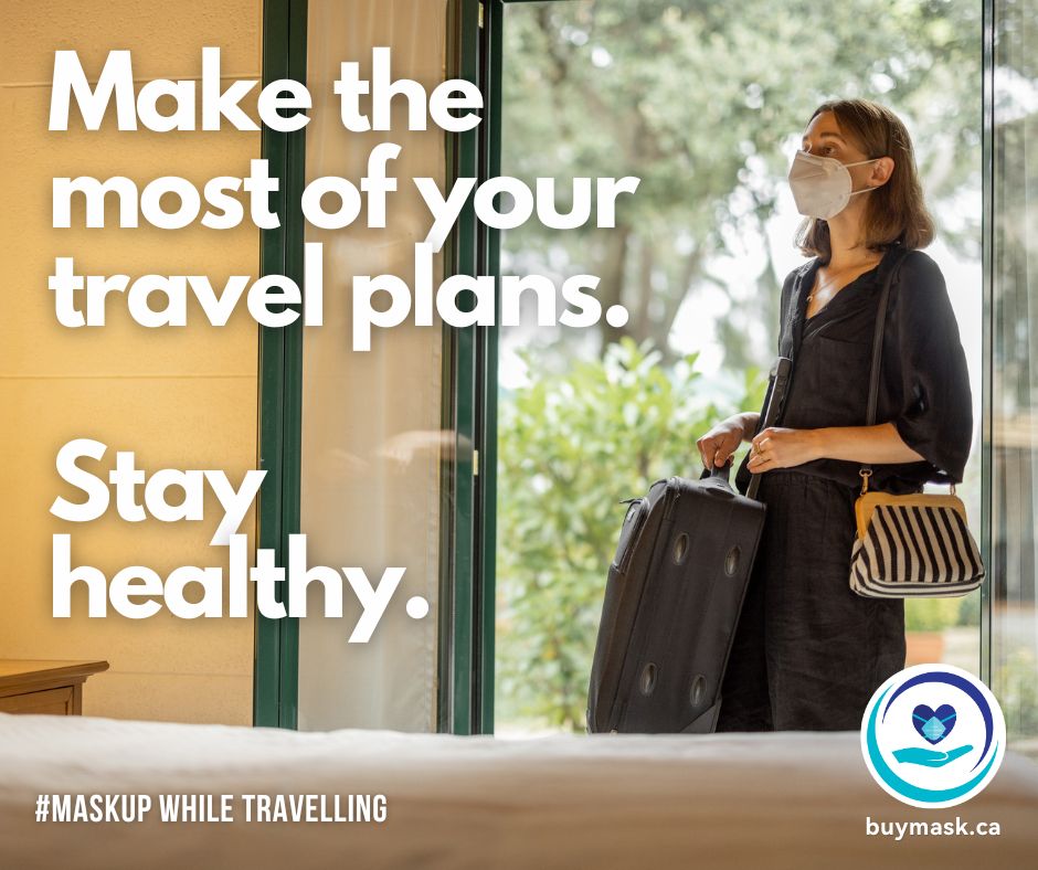 "Make the most of your travel plans. Stay healthy. #MaskUp While Travelling - buymask.ca" 
Photo of a woman holding a suitcase and a purse entering a hotel room while wearing a white N95 mask. 