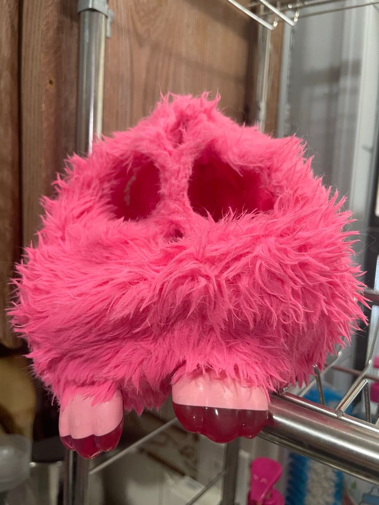 The flesh of a furby connect drying on a kitchen rack