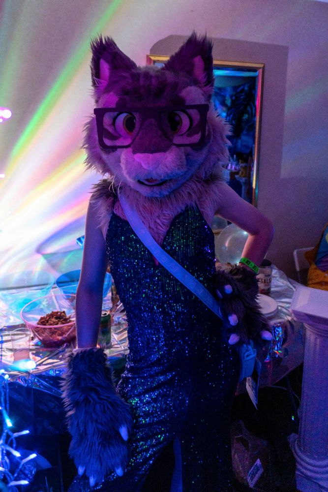 me in partial fursuit and sequin dress at pawcon vaporwave party 