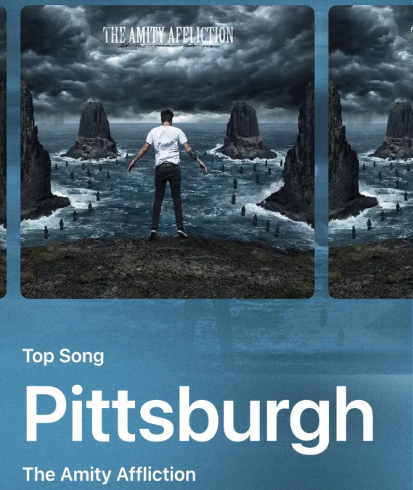 From Apple Music, my top song for 2025.  Album cover: a man in a white t shirt standing on the edge of an ocean. Album is "The Amity Affliction - Let the Oceans Take Me".  The song is "Pittsburgh" by the Amity Affliction.