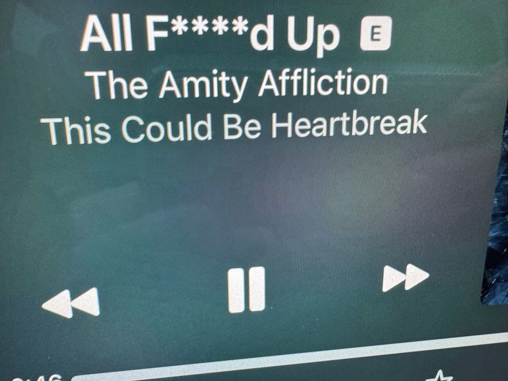 Screenshot of song playing in my vehicle 

All F****d Up • The Amity Affliction This Could Be Heartbreak