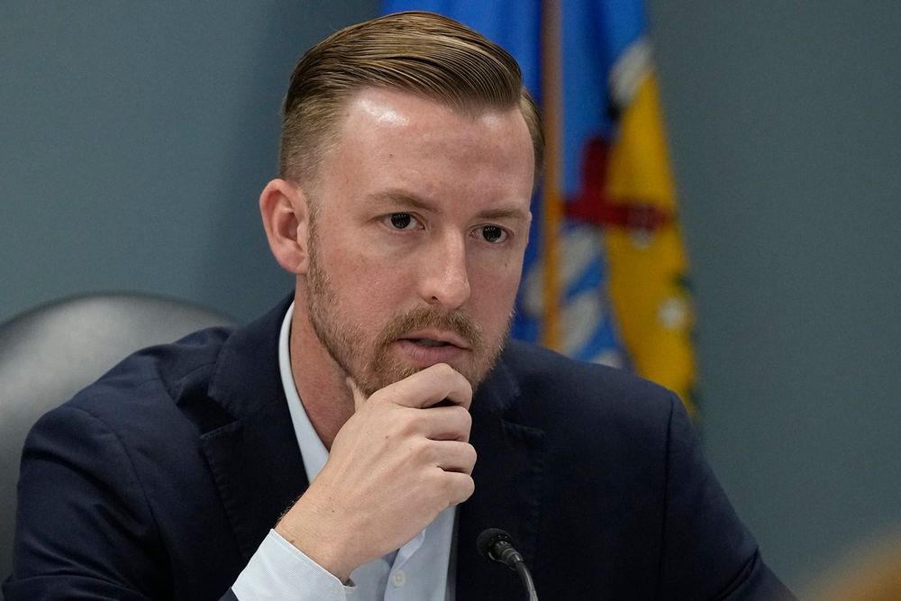 A newly installed TV automatically plays an action movie channel and happened to be showing a film that contained nudity, the Republican lawmaker said