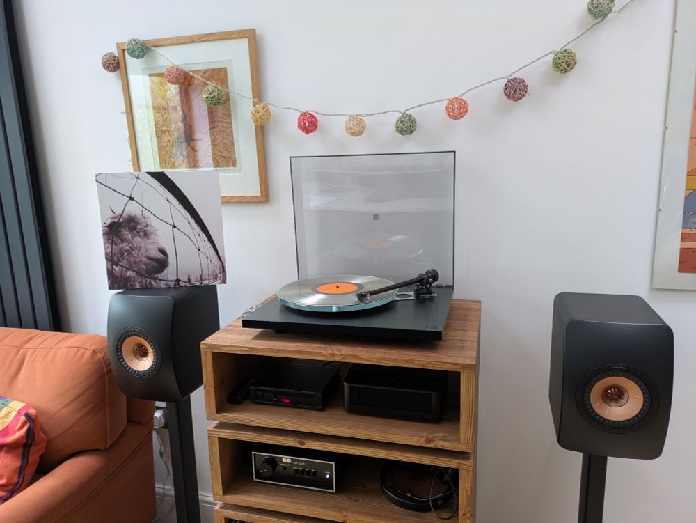 A clear vinyl pressing of Pearl Jam Vs. spinning on a Rega Planar 3 RS 