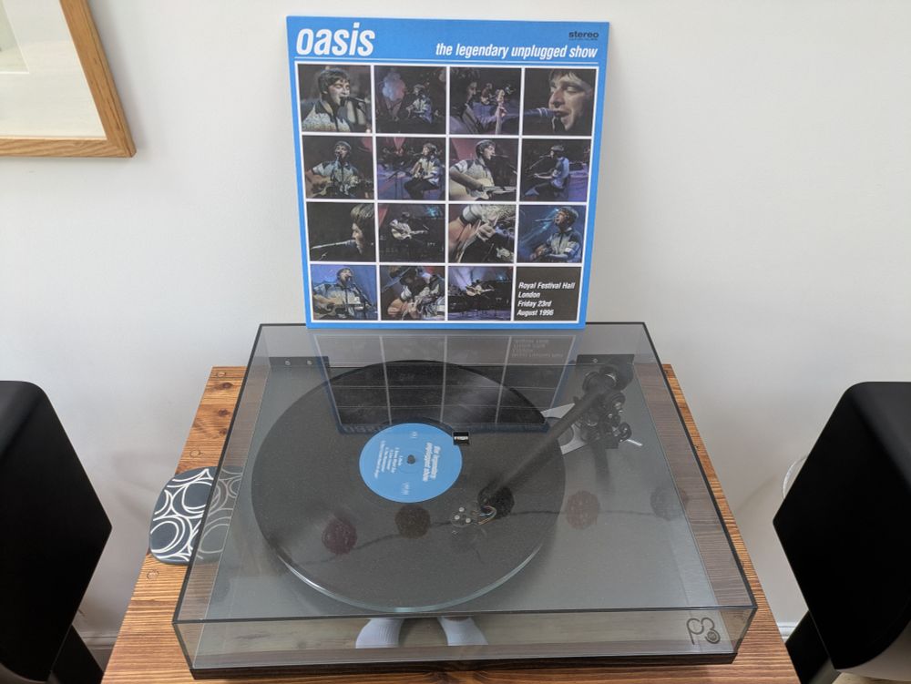 A live Oasis performance spinning on a Rega Planar 3 RS 