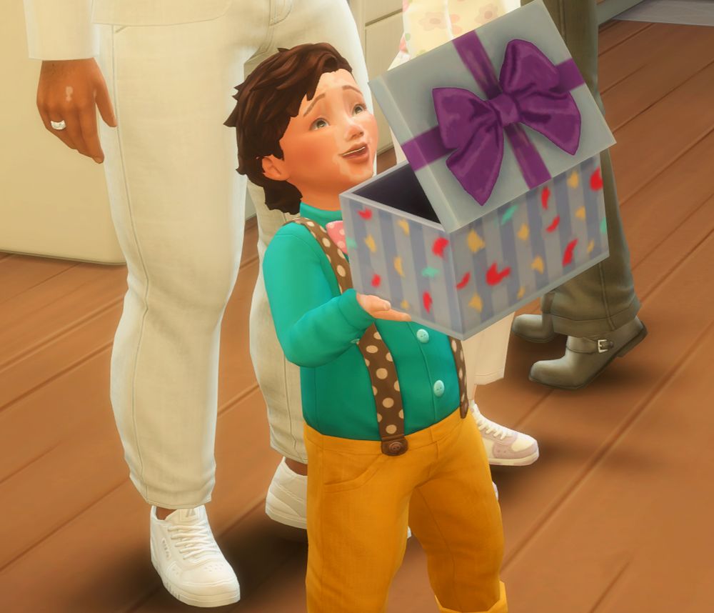 Cecil as he's opening a birthday present, still wearing the same suit.