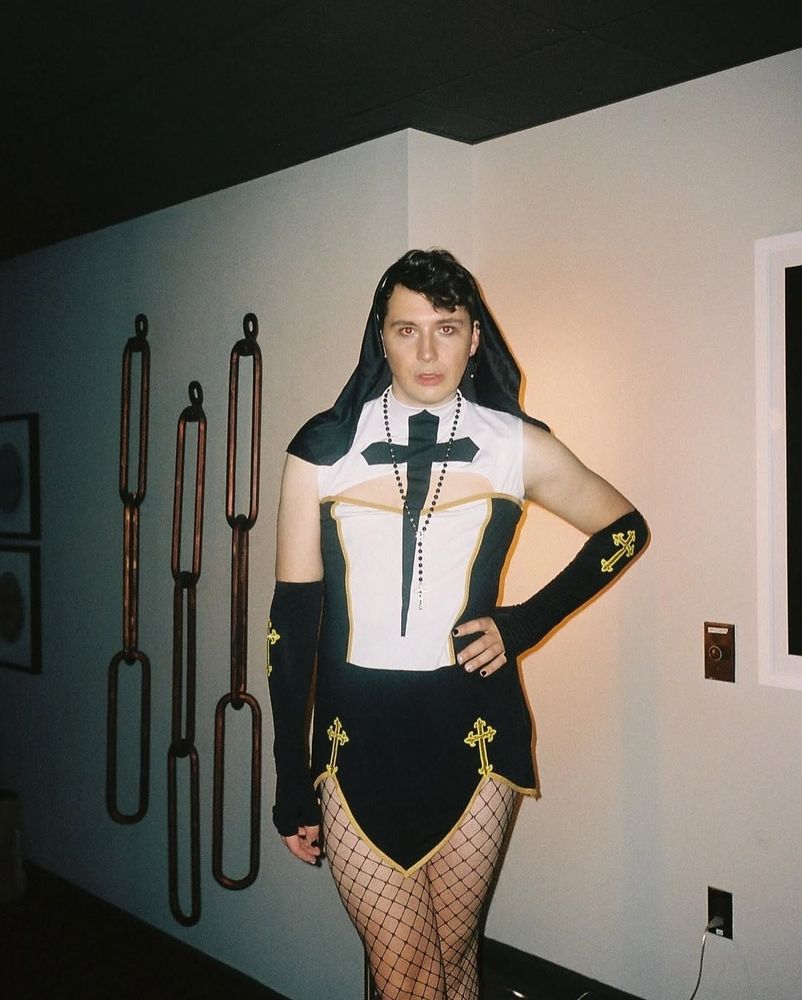 Sister Daniel standing with her left hand on her hip.