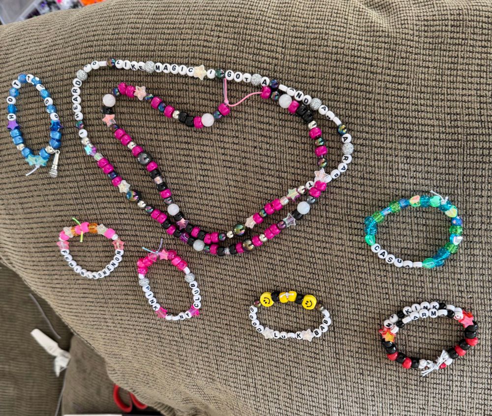 An assortment of Chappell Roan-themed Kandi/friendship bracelets. 