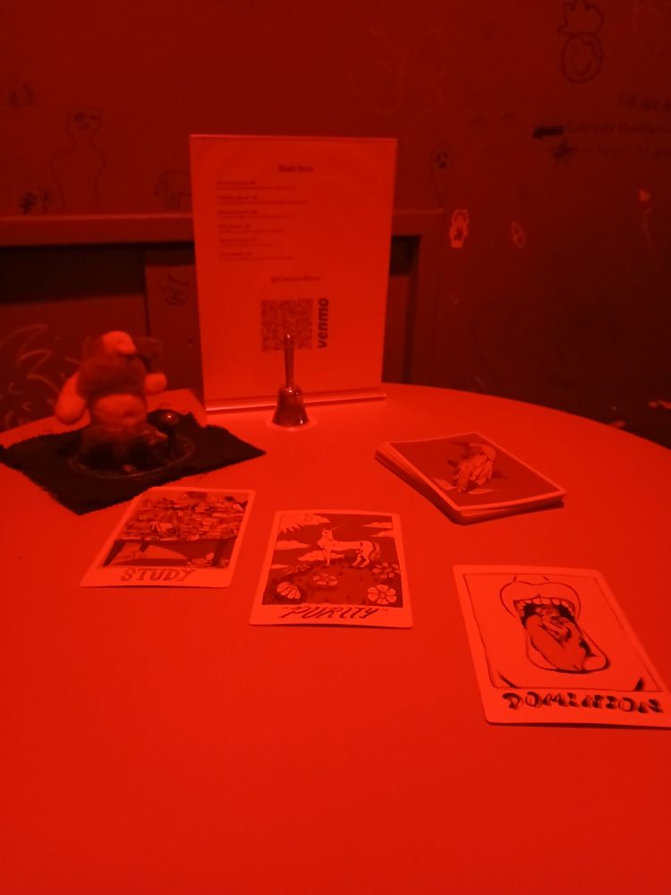 Three fortune telling cards from the N. O. D. filled with ominous portent. Hephestus, squat and cute, crouches on the seventh pentacles of Saturn in the background with a small bell.