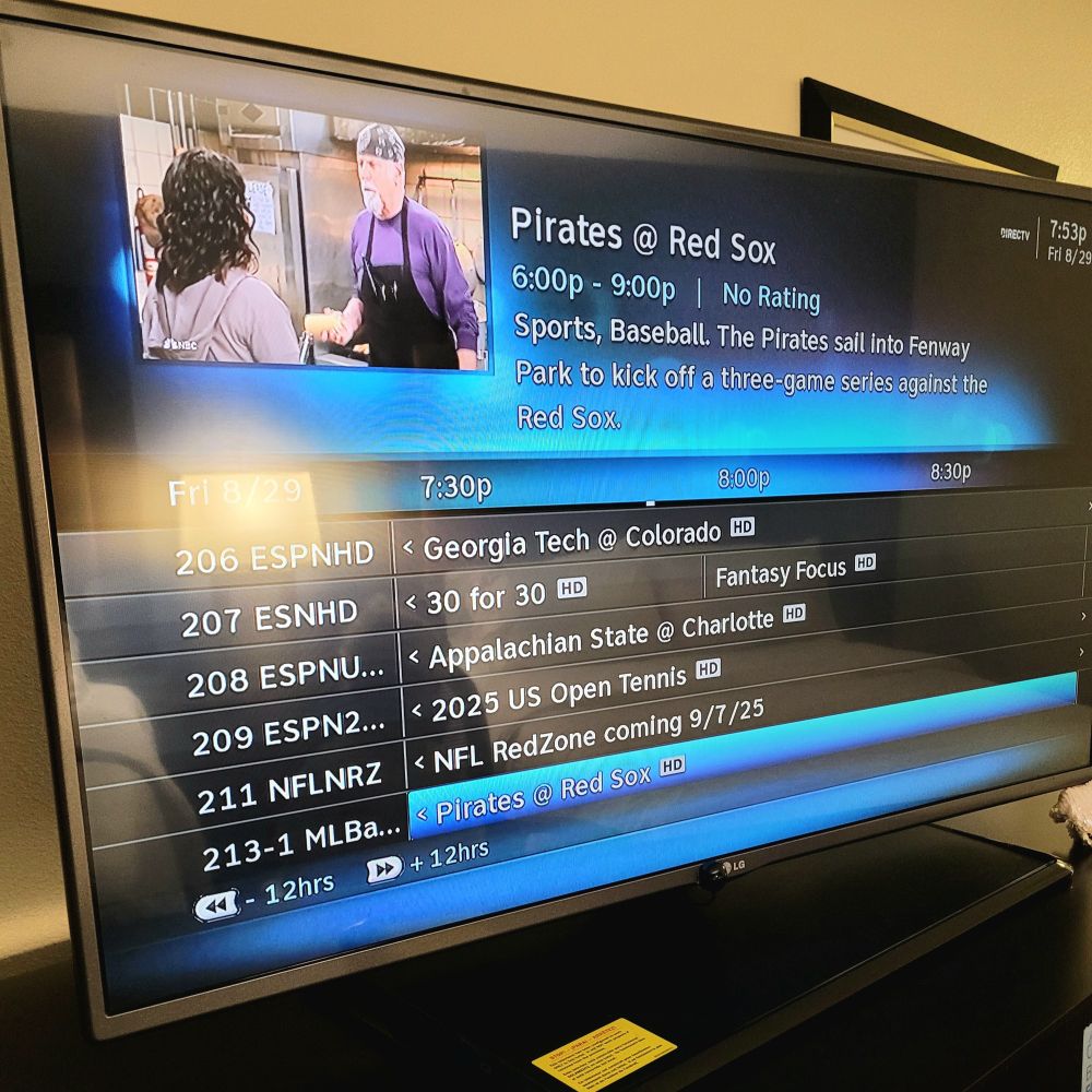 Hotel TV guide showing a Pirates vs. Red Sox baseball game