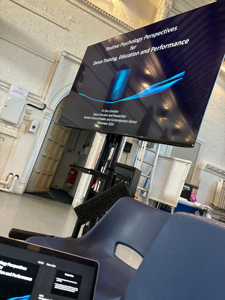 TV screen showing starter slide about positive psychology.