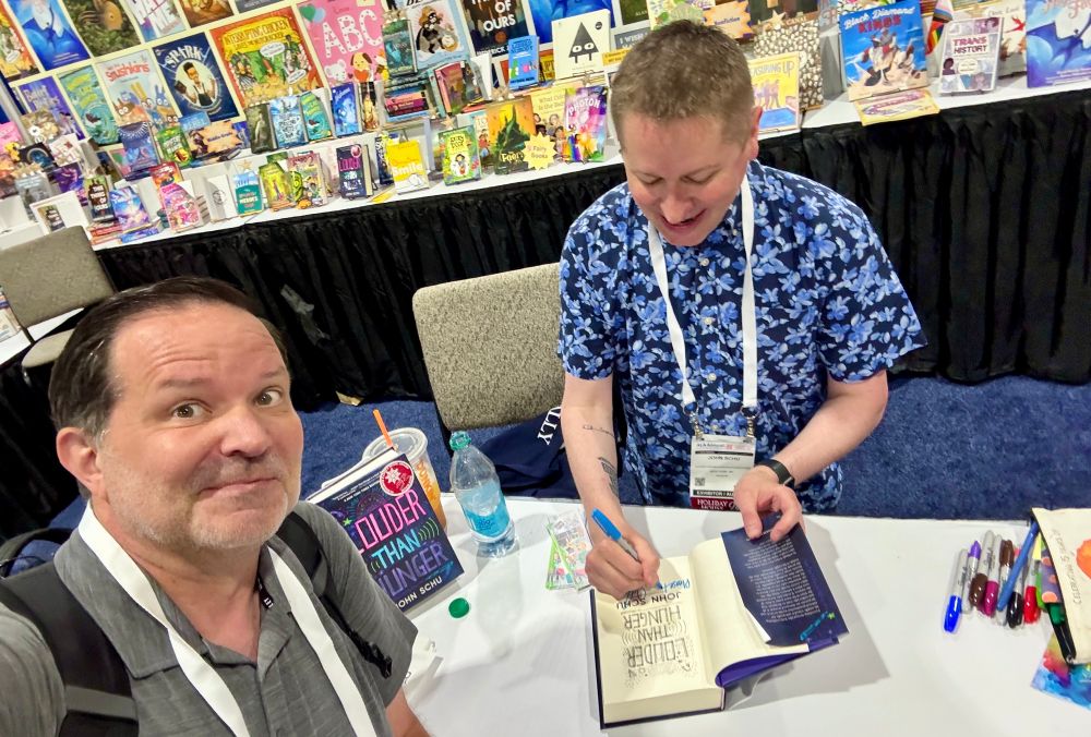 Cool author signing their book