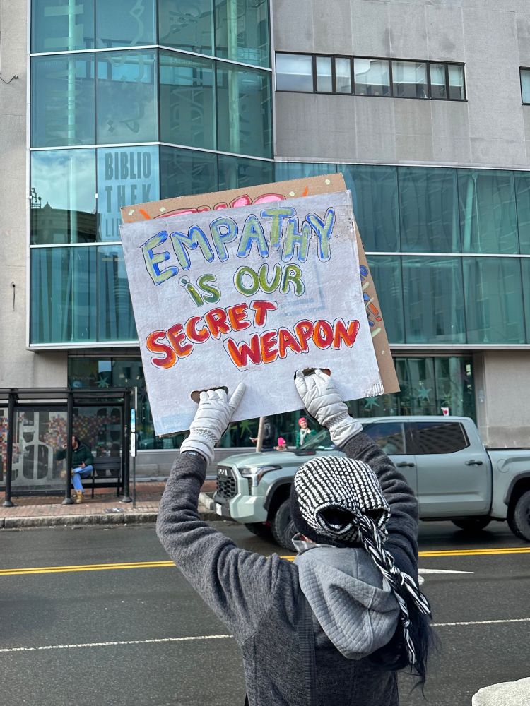 Sign saying “Empathy is our secret weapon”