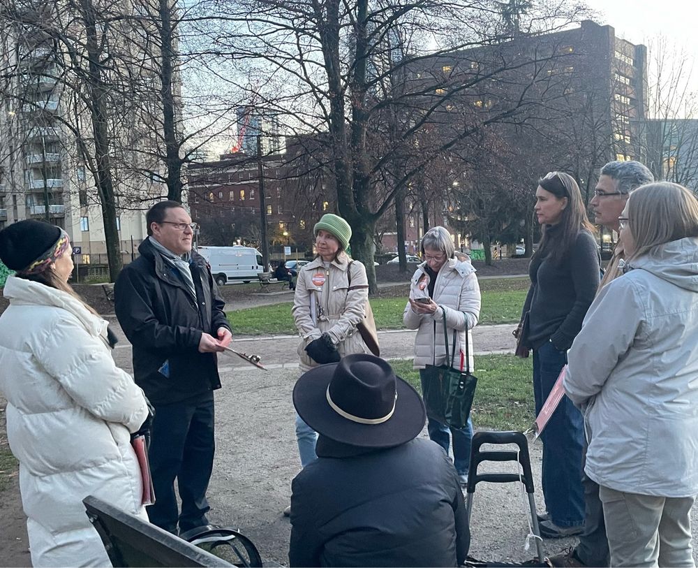 Avi speaking to a group of volunteers in Nelson Park in the West End. 