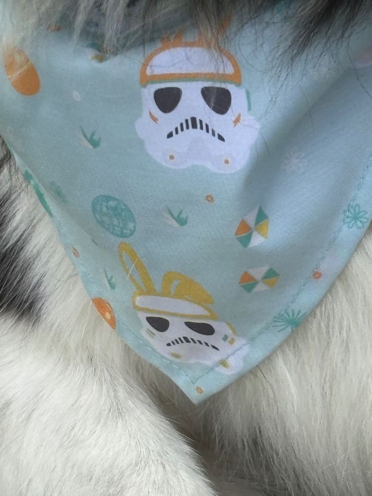 Upon closer inspection his bib is a STORM TROOPER with bunny ears Easter bib!